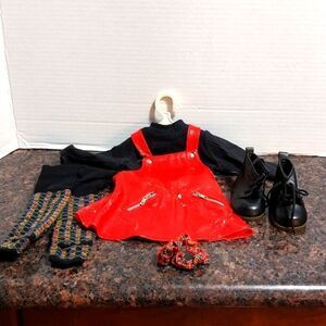 Pleasant Company 2998 Red Jumper,  Ponytail Holder, Tights, and Black Top.